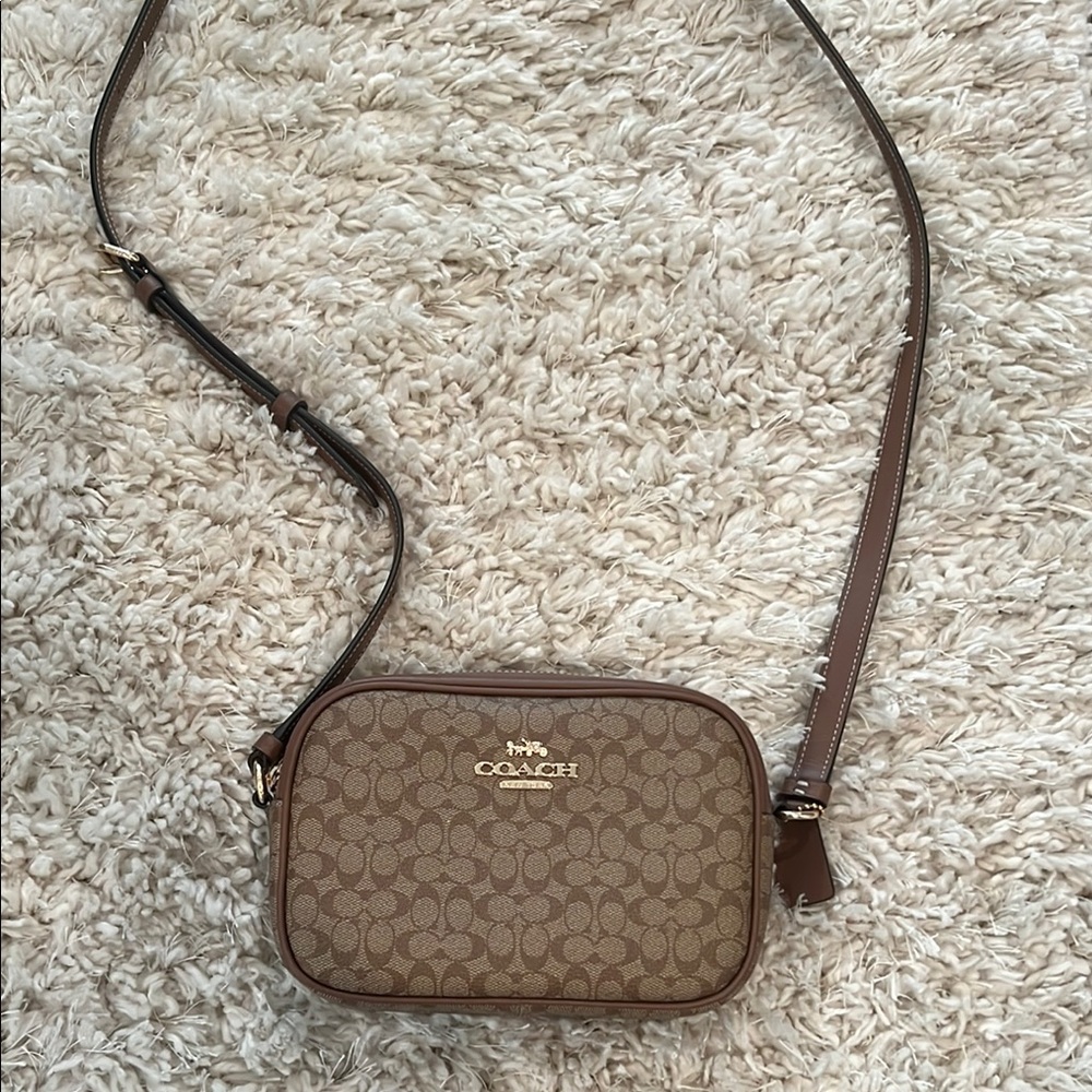 Coach Brown Crossbody Bag with Adjustable Strap and Leather Trim